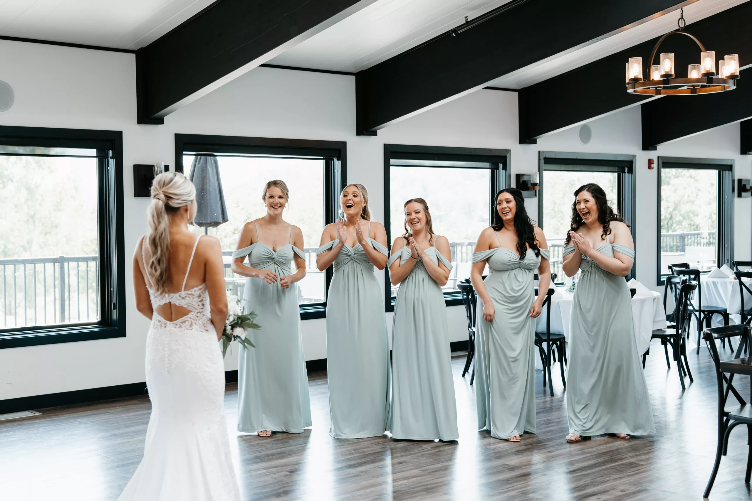 bride first look with bridesmaids at red wing golf course