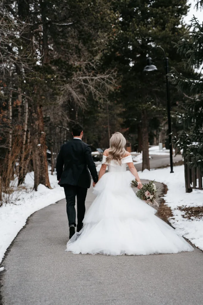 Bride and groom that just got married in the winter at Silverthorne Pavilion