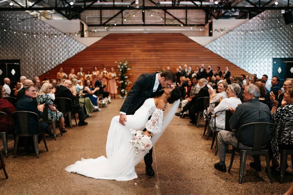 Bride and groom just got married at quincy hall in Minneapolis, a modern wedding venue