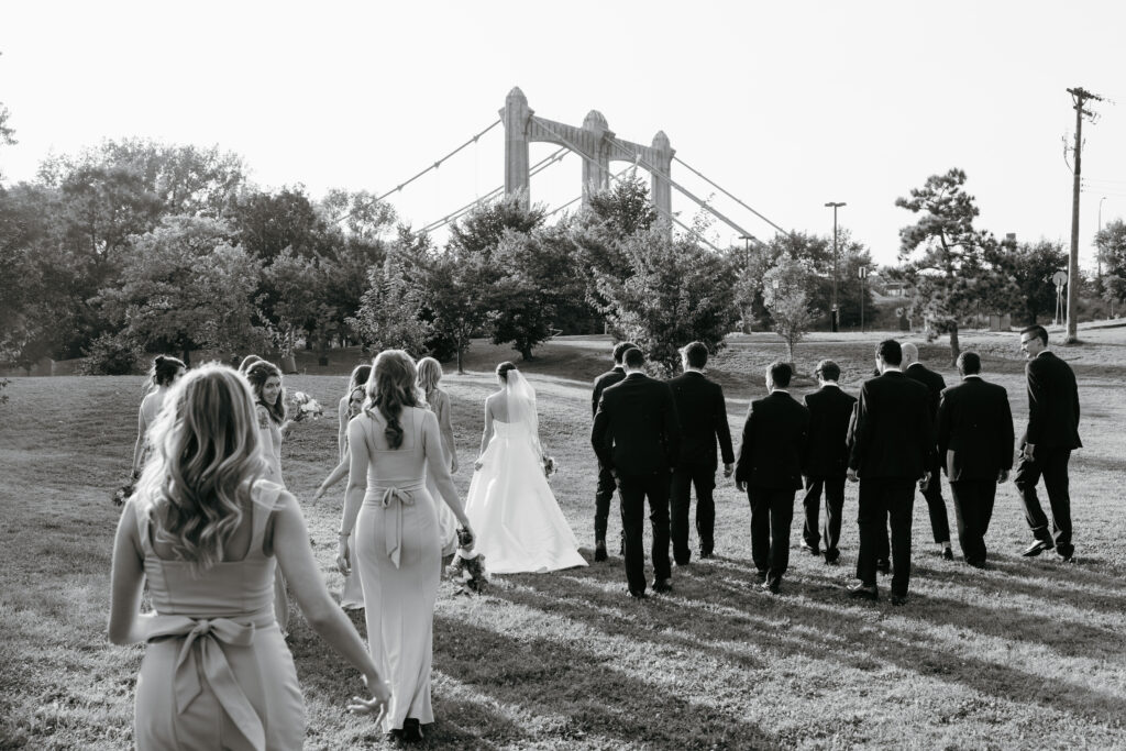 Bridal party walking at Nicollet Island Pavilion, a minnesota wedding venue located in the heart of Minneapolis