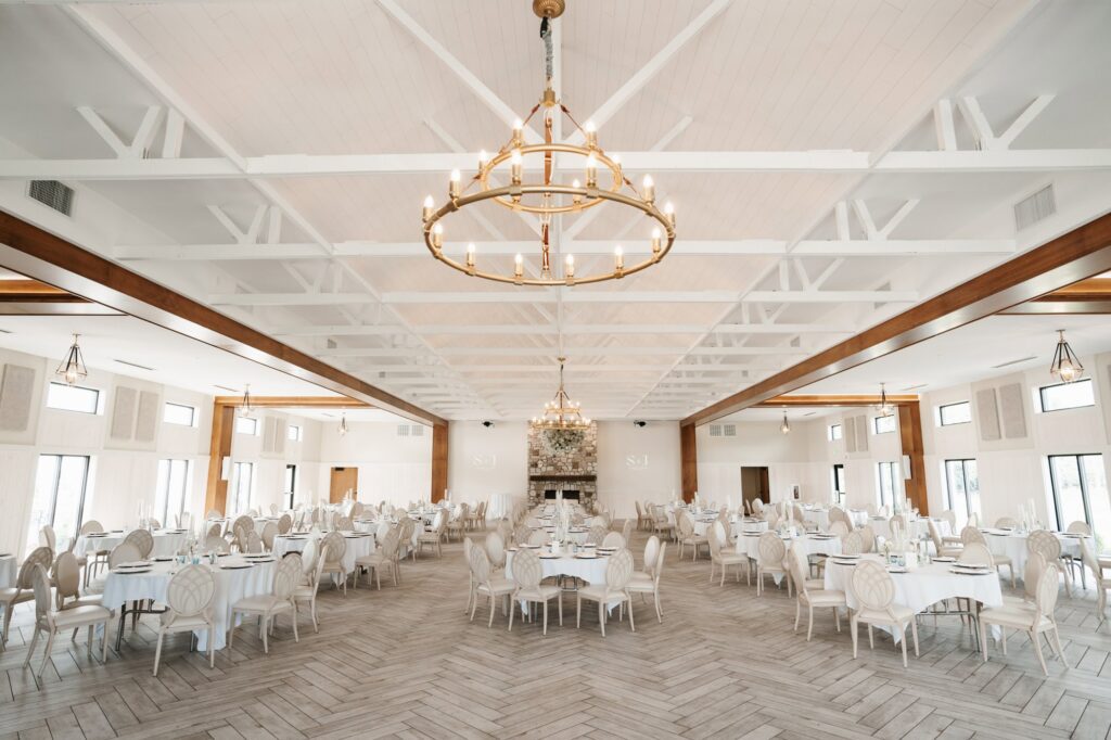 Ballroom reception at Equestria west by bavaria downs, a luxury wedding venue in Chaska Minnesota voted best of minnesota bride and also featured on reality TV show love is blind. Photo taken by Halle from Lulle Photo and film, a minnesota wedding photographer based in Minneapolis.