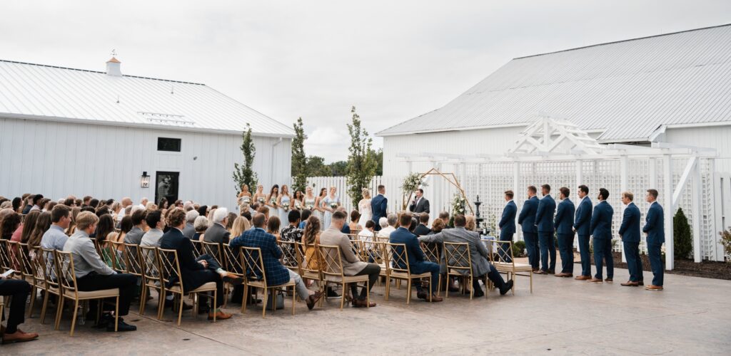 outdoor ceremony at equestria west in the court yard on a spring summer day in Minnesota