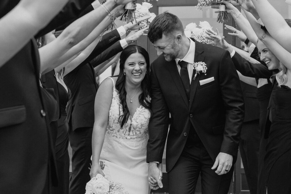 Bride and groom getting married at Woodhaven, a black and white portrait by Lulle Photo. A minnesota wedding photographer.